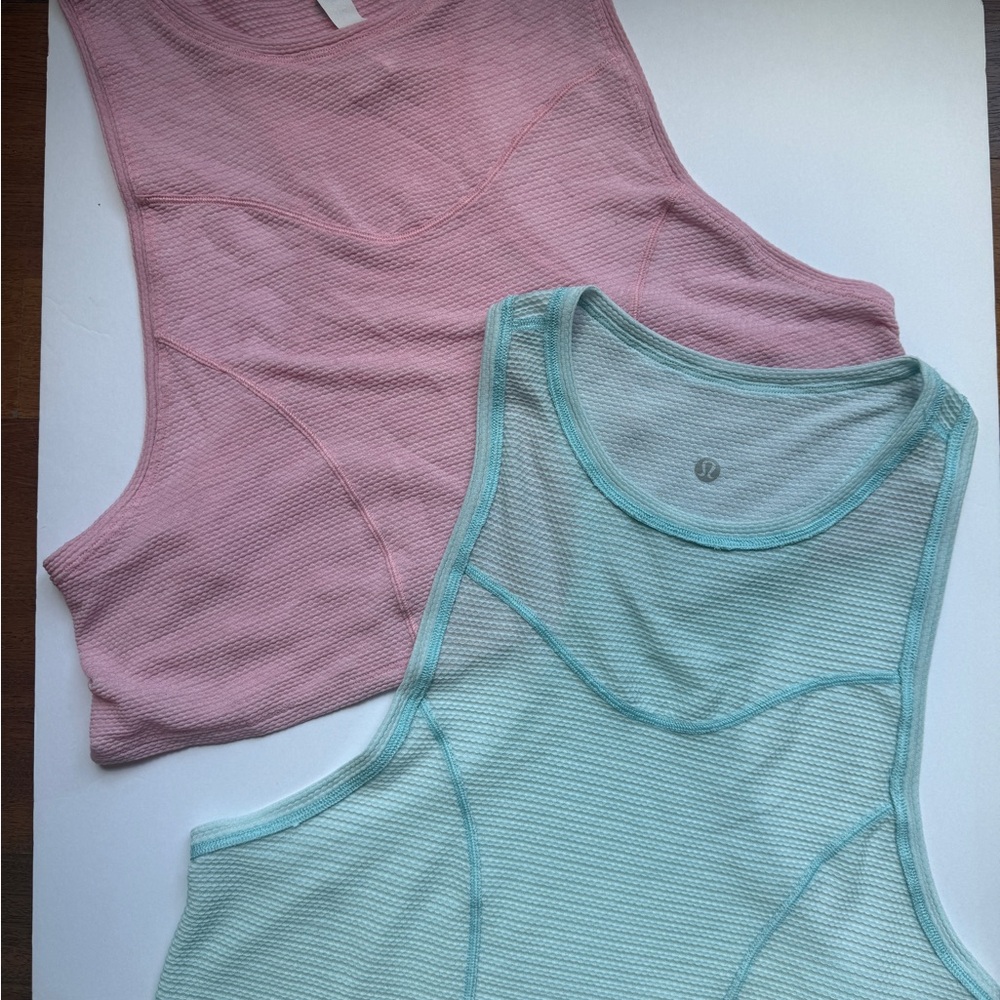 X2 Lululemon Stronger as One Muscle Tanks
